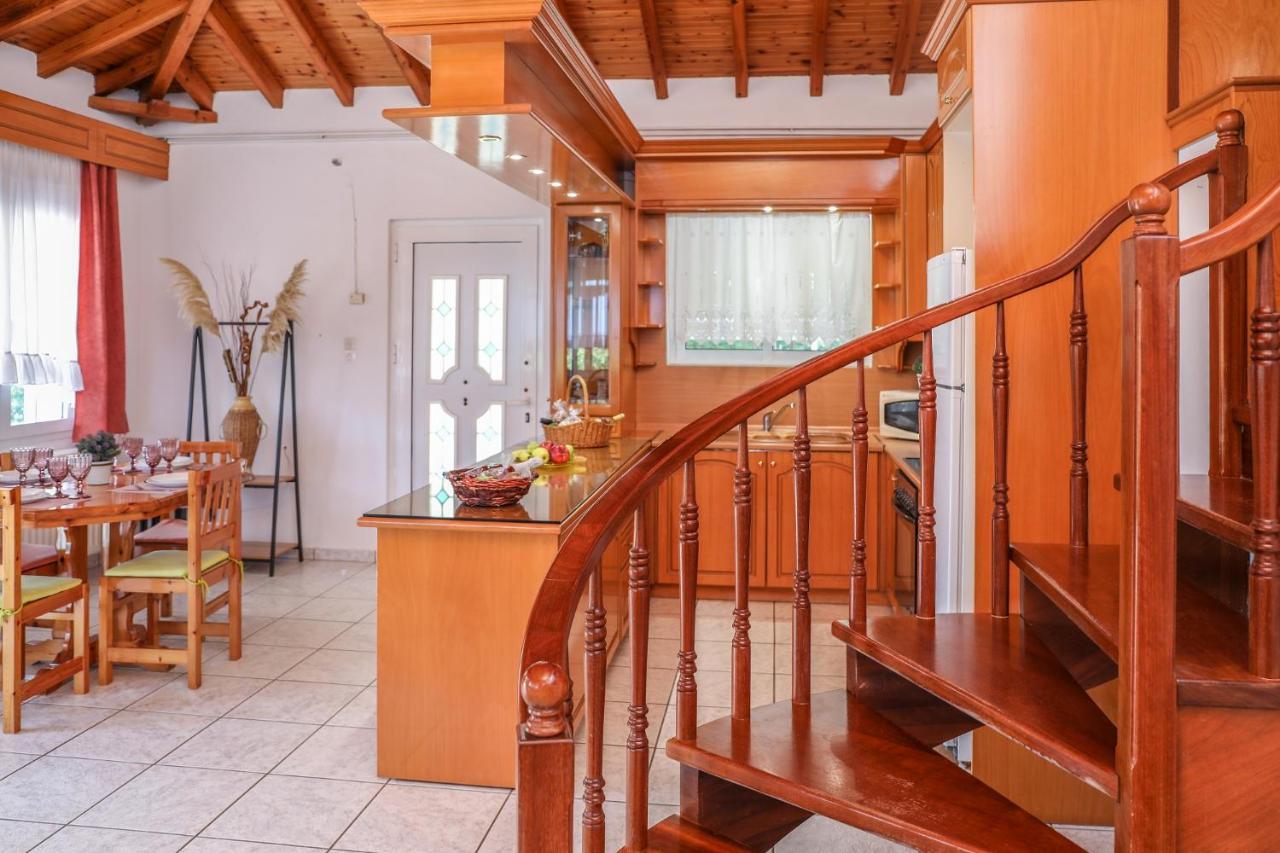 Villa Mitzelos Moni Evaggelistrias Bagian luar foto