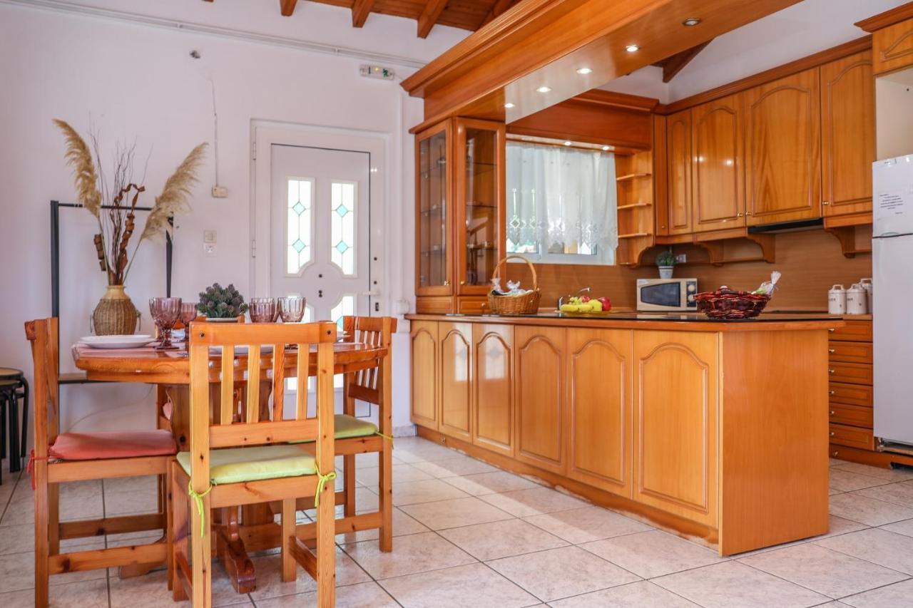 Villa Mitzelos Moni Evaggelistrias Bagian luar foto