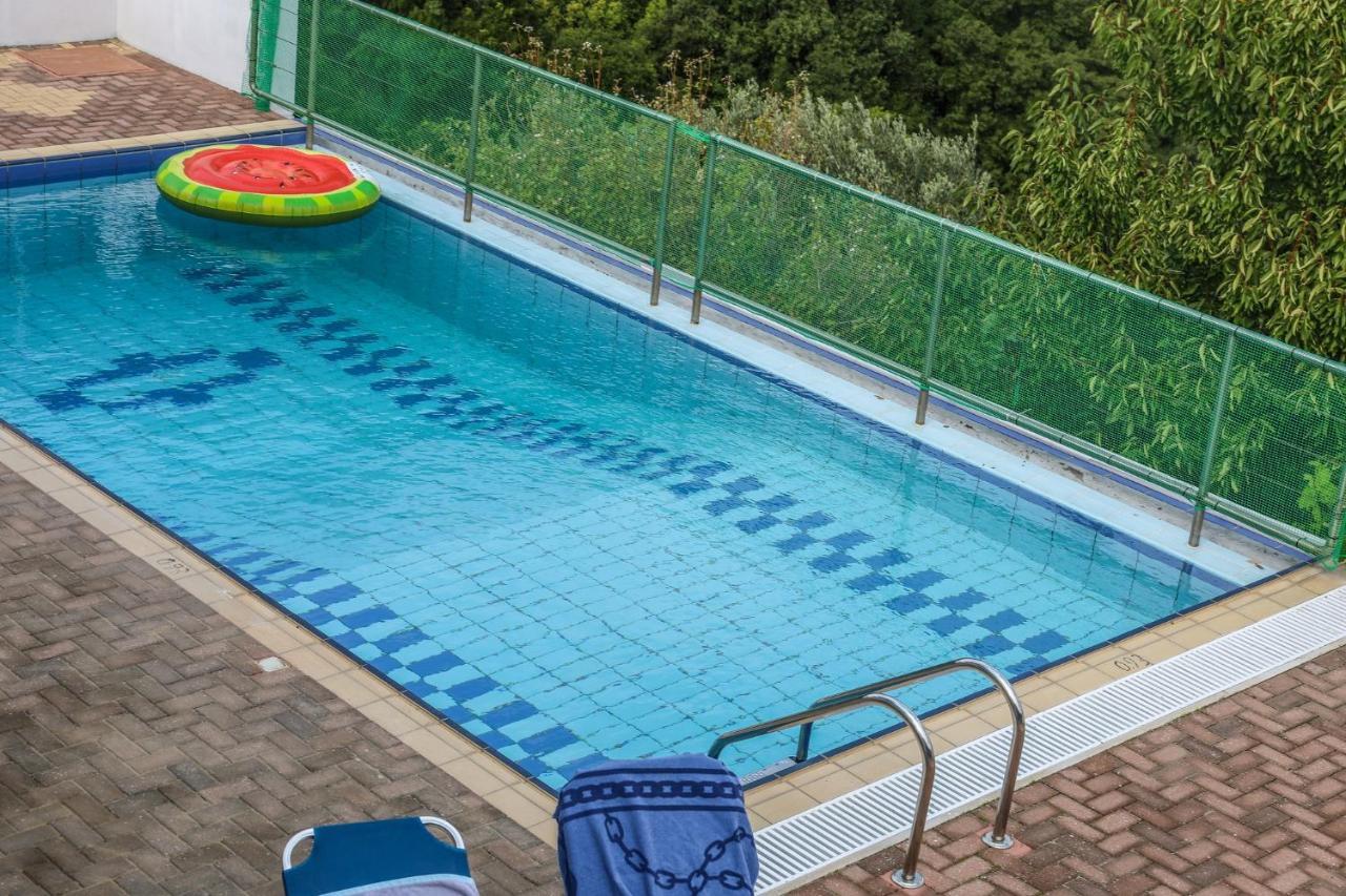 Villa Mitzelos Moni Evaggelistrias Bagian luar foto