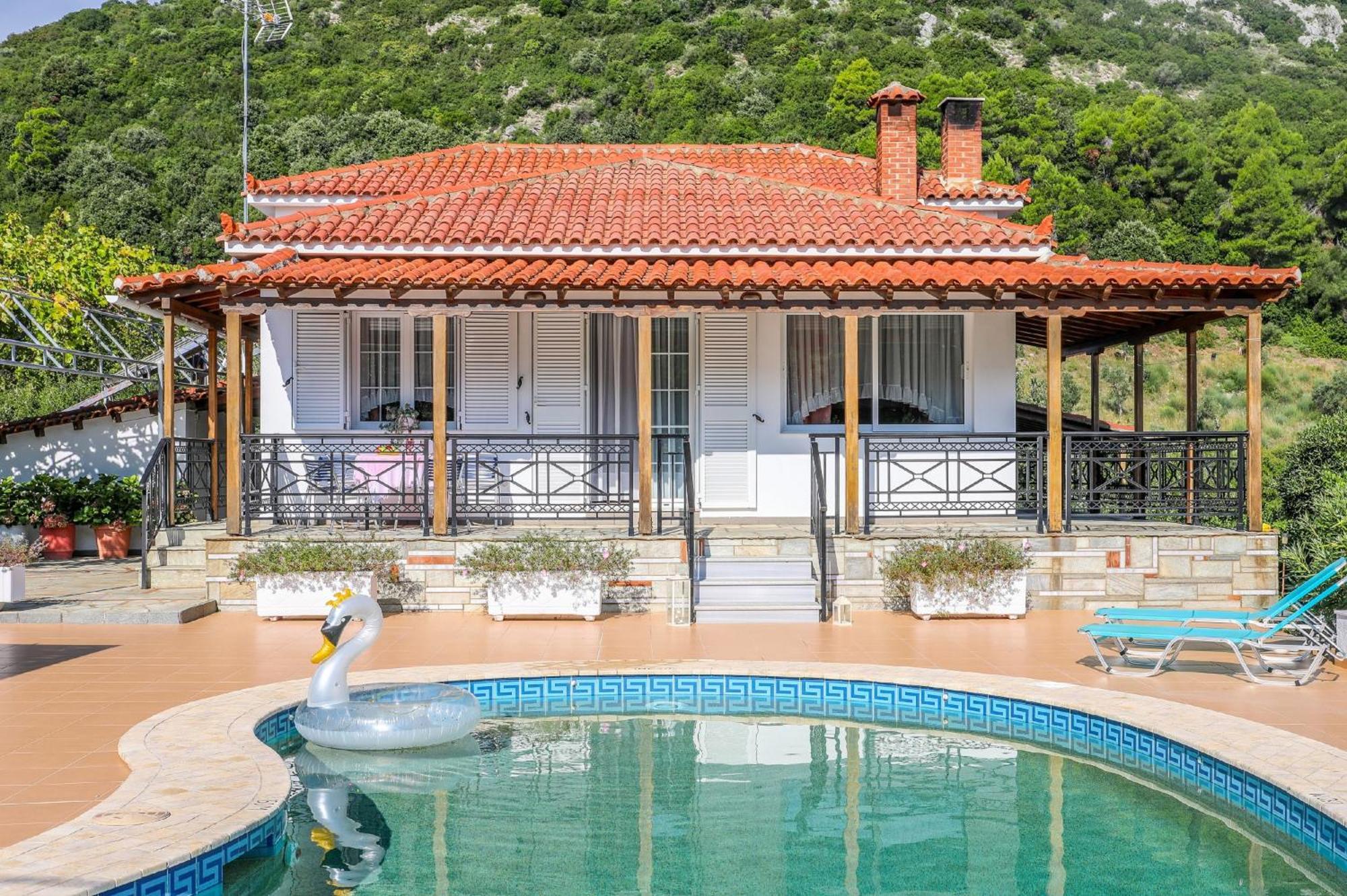 Villa Mitzelos Moni Evaggelistrias Bagian luar foto